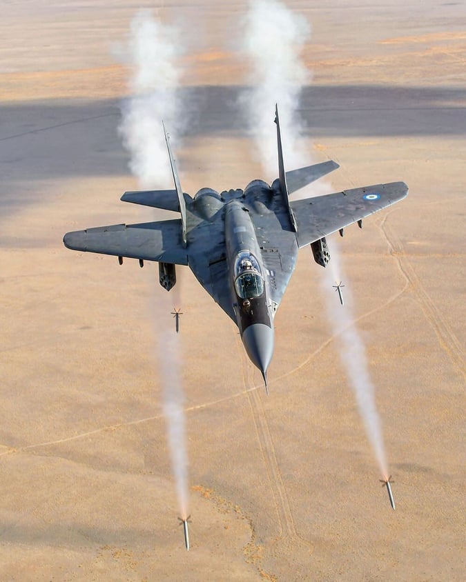 Figure 11. Uzbekistan Air Force MiG-29S firing unguided S-8 rockets